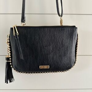 Jessica Simpson crossbody handbag. Black. Approximately 11” wide by 7.5” tall.